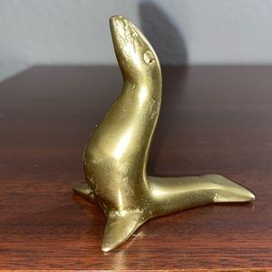 Brass seal/sea lion decor